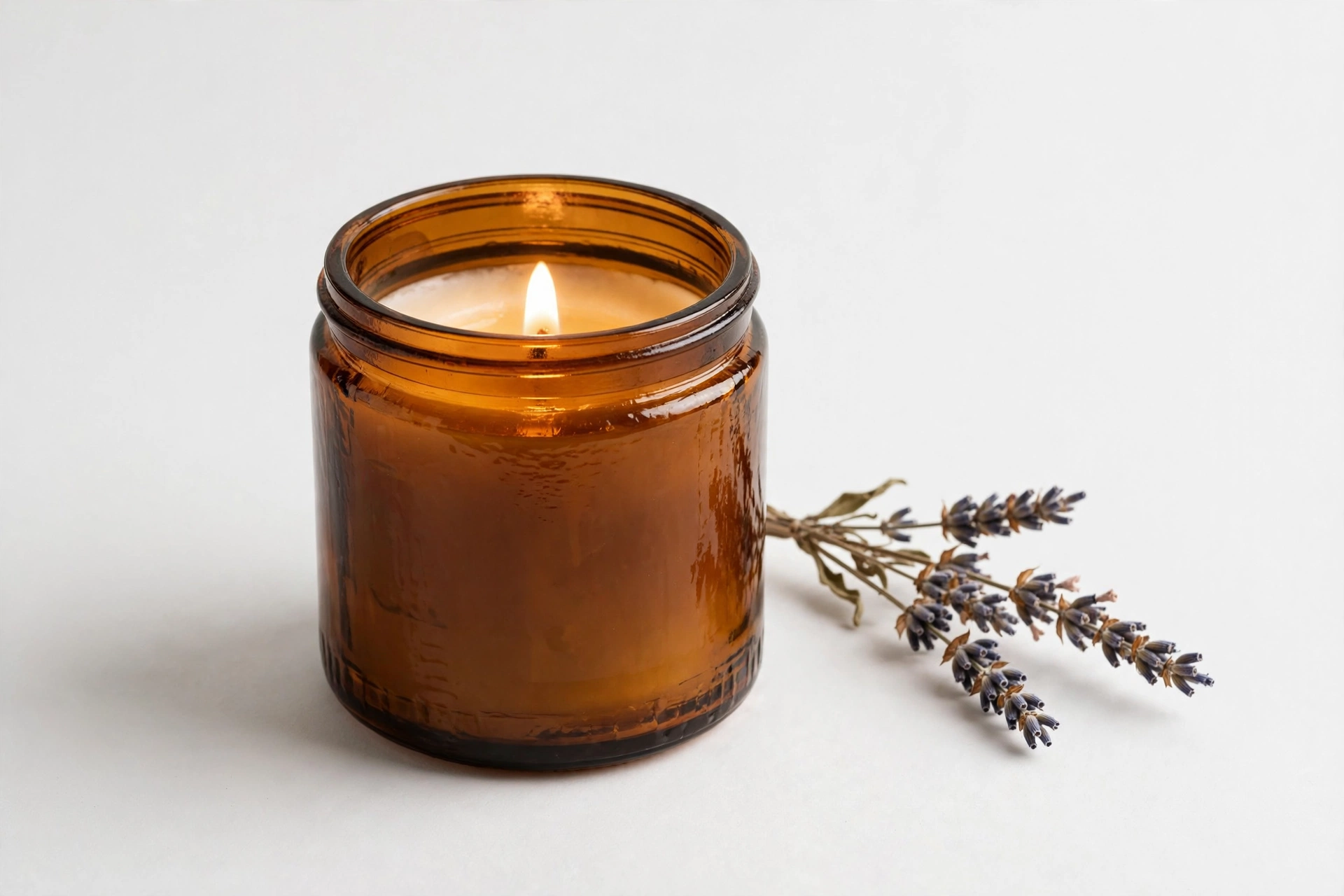 Candle photographed in soft studio lighting